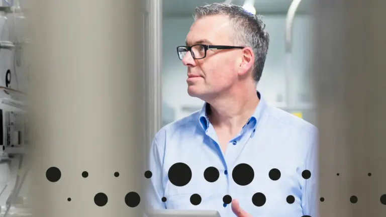 Man looking at machines