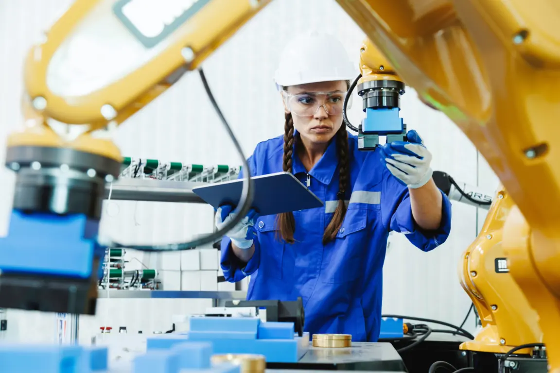 Apprentice using machinery
